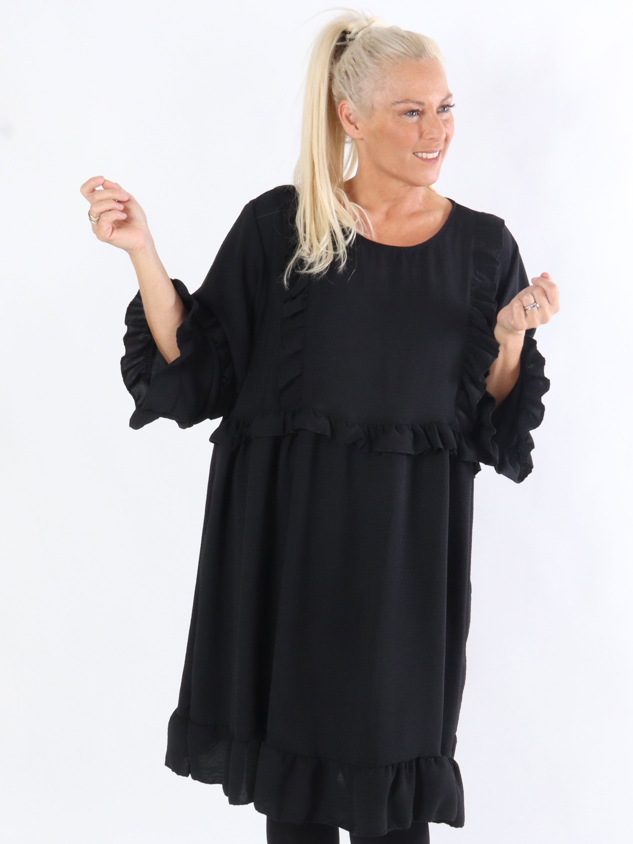 Thyra - Klänning med volangkanter framtill